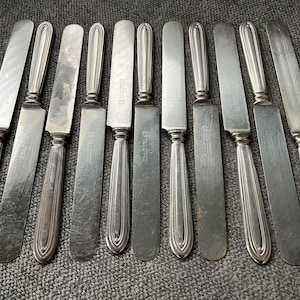 Wm A Rogers silver plate butter knives (11)