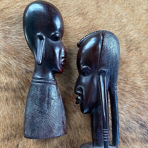 Two hand carved ebony figures