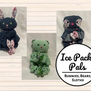 May include: Three handmade plush toys in the shapes of a bunny, bear, and sloth. The toys are made from denim and fleece fabrics and are filled with ice packs. The toys are labeled "Ice Pack Pals, Bunnies, Bears, Sloths".
