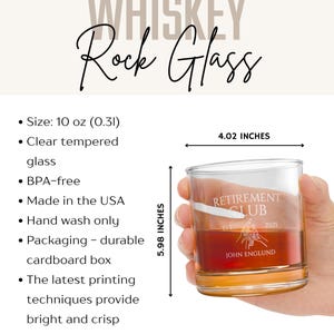 May include: Clear, tempered glass whiskey rock glass with "Retirement Club" and "John Englund" printed on it. The glass is 4.02 inches wide and 5.98 inches tall. The glass is filled with a brown liquid.