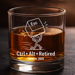 May include: A clear glass tumbler filled with amber liquid, featuring a white etched graphic of a stick figure carrying an Esc key. Below the figure, the text reads Ctrl + Alt + Retired, followed by the name Tommie and the year 2026.