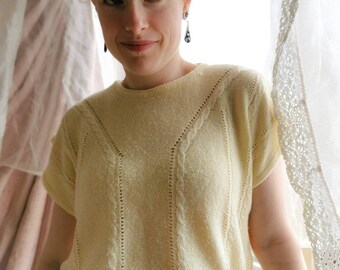 Zachtgele vintage trui