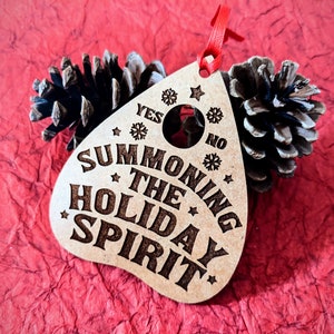 Summoning the holiday spirits wooden planchette Christmas ornament. Ouija. Yule ornaments. Horror Christmas. Christmas ghosts