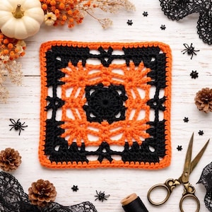May include: A square, crocheted Halloween-themed doily in black and orange. The doily features a central black circle surrounded by orange starbursts and a black border. Decorative elements include miniature spiders, pinecones, and a pumpkin.