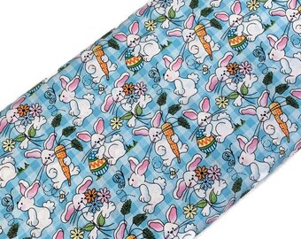Easter Bunny Fabric Sold by the YARD. 100% Cotton Blue Plaid with Easter Bunnies, Carrots Eggs and Spring Flower for Quilts, Clothing, Décor
