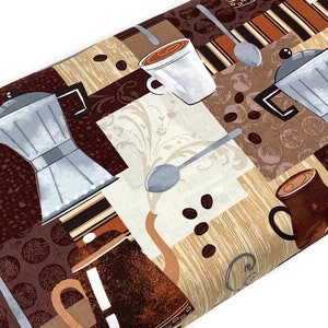 May include: A brown and beige fabric with a coffee theme. The fabric features illustrations of coffee pots, coffee cups, coffee beans, and spoons. The fabric is perfect for crafting projects, quilting, and home decor.