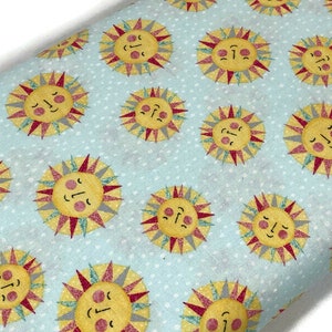 Smiling Sun Fabric by the YARD--Yellow & Rainbow Suns on Sky Blue/White Polka Background. 100% Cotton for quilting, apparel, home décor.