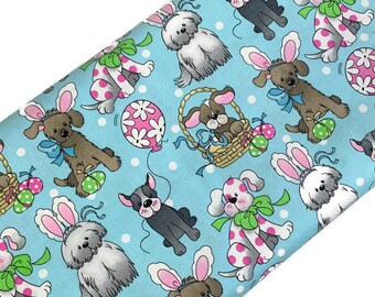 Easter Puppies with Bunny Ears Fabric Sold by the YARD. Easter Eggs & Baskets on Light Turquoise. 100% Cotton for Quilting, Clothing, Décor.