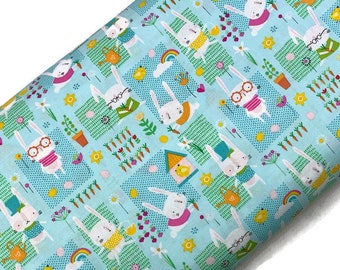 Aqua Garden Easter Bunny Fabric Sold by the YARD. Rabbits, Rainbows, Carrots, Springtime Print.  100% Cotton for Quilting, Clothing, Décor.