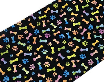 Dog Bones and Paws Fabric Sold by the YARD. Bow Wow by Freckle + Lollie. Assorted Colors on Black. 100% Cotton for Quilting, Sewing, Decor.