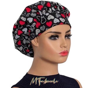 May include: A black and red scrub hat with a heart pattern. The hat is made of a soft, comfortable fabric and is perfect for nurses, doctors, and other healthcare professionals.