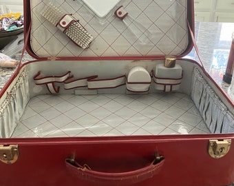 vintage red madler (German) suitcase (child’s ?) with original travel brushes, containers, mirror-