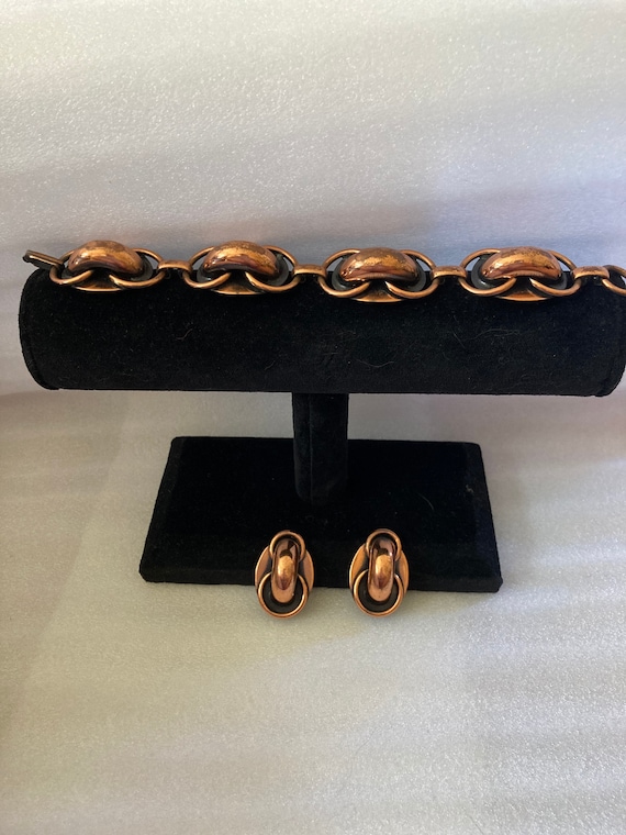 Copper colored vintage bracelet with matching clip