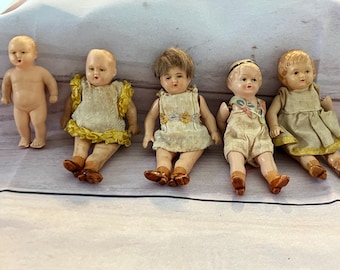 Antique celluloid dolls with original clothing- made in Germany!