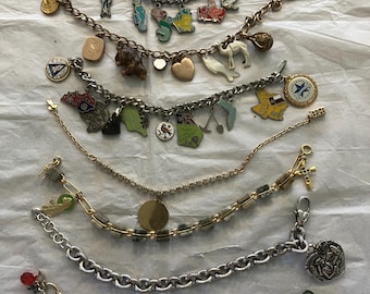 vintage charm bracelets- Disney, travel, all unique