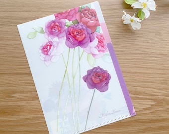 May include: A clear plastic folder with a floral design featuring pink and purple roses. The folder has a purple border and the text "Modern Flowers" is printed on the bottom right corner.
