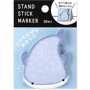 May include: A pack of whale shark-shaped sticky notes. The notes are pale blue with darker blue spots and a white underside. The packaging features the text "STAND STICK MARKER" and "30 sheets".