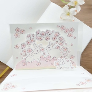 Carte de voeux - Fleurs de cerisier printanières - Lapins pop-up 3D par Schinako Moriyama - 1 pièce