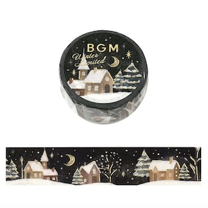 May include: A roll of decorative washi tape featuring a black night sky with gold foil stars and a crescent moon. The design depicts a snowy village scene with brown houses, evergreen trees, and white snow. The text BGM Winter Limited is printed.