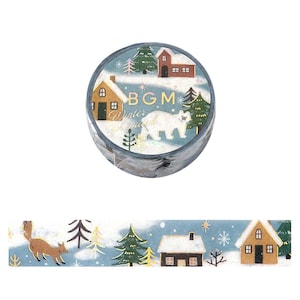 May include: A roll of decorative washi tape featuring a winter scene with brown houses, green pine trees, a white polar bear, and a fox. The text BGM and Winter Forest is printed in gold foil on the tape roll against a blue background.