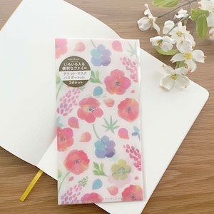 May include: A clear plastic file folder with a floral design featuring pink, red, blue, and green flowers. The text on the folder reads "いろいろ入る 便利なファイル チケット・マスク パスポート etc... 2ポケット You can do".