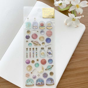 Stickers dorés scintillants en résine - Drop Seal - Planètes et étoiles - 1 pièce