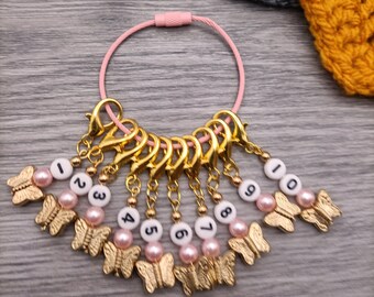 Set of 10 stitch markers, number stitch markers, crochet hook reminders, row counters, knitting needle size markers