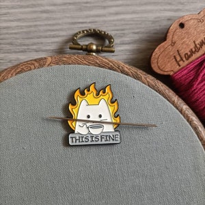 This is fine Needle minder , Needle Keeper, needle magnet, magnetic, needle work supplies for embroidery and cross stitch