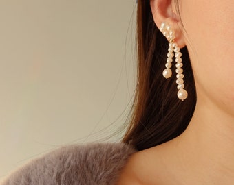 ピアス Tiny Pearl Bow Earrings il_340x270.4588120632_gd6v.jpg