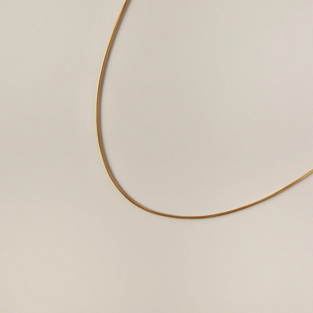 Long Snake Chain Necklace with Pearl Fob in Gold main image 0