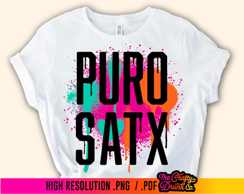 May include: White t-shirt with a black graphic design that says "PURO SATX" in a spray paint style with pink, orange, and turquoise accents.