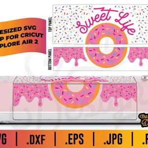 May include: A pink Cricut Explore Air 2 machine with a pink and white vinyl decal that says "Sweet Life" with a pink donut with sprinkles. The decal is designed to wrap around the machine.