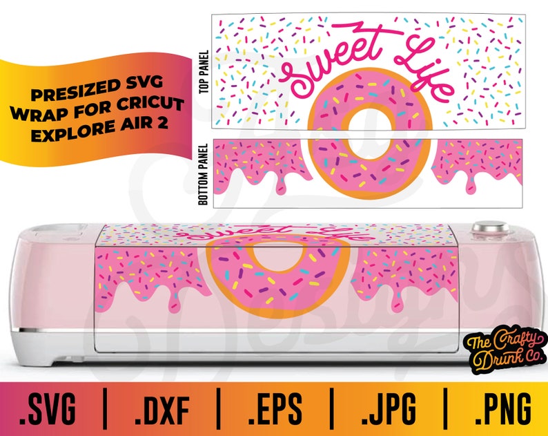 May include: A pink Cricut Explore Air 2 machine with a pink and white vinyl decal that says "Sweet Life" with a pink donut with sprinkles. The decal is designed to wrap around the machine.