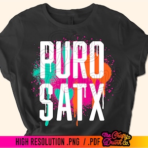 May include: Black t-shirt with a white graphic that says "PURO SATX" in a paint splatter design with pink, orange, teal, and blue accents.