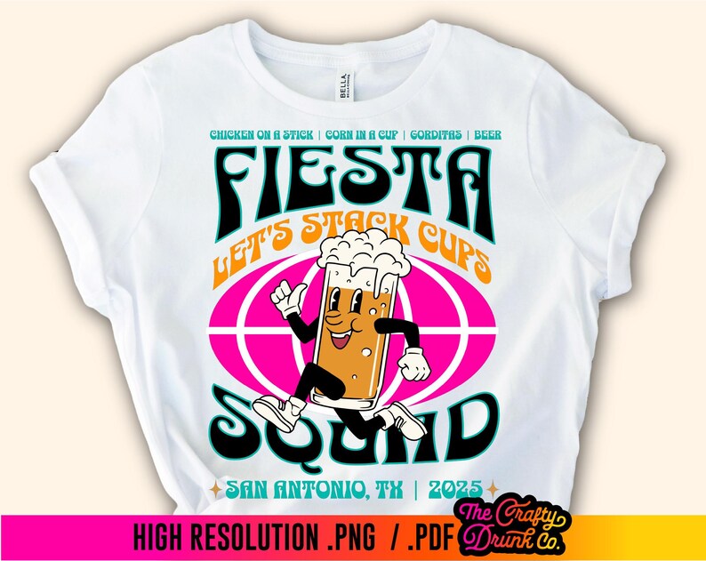 May include: White t-shirt with a colorful graphic design featuring a cartoon beer mug running with the text "Fiesta Let's Stack Cups Squad" and "San Antonio, TX | 2025".