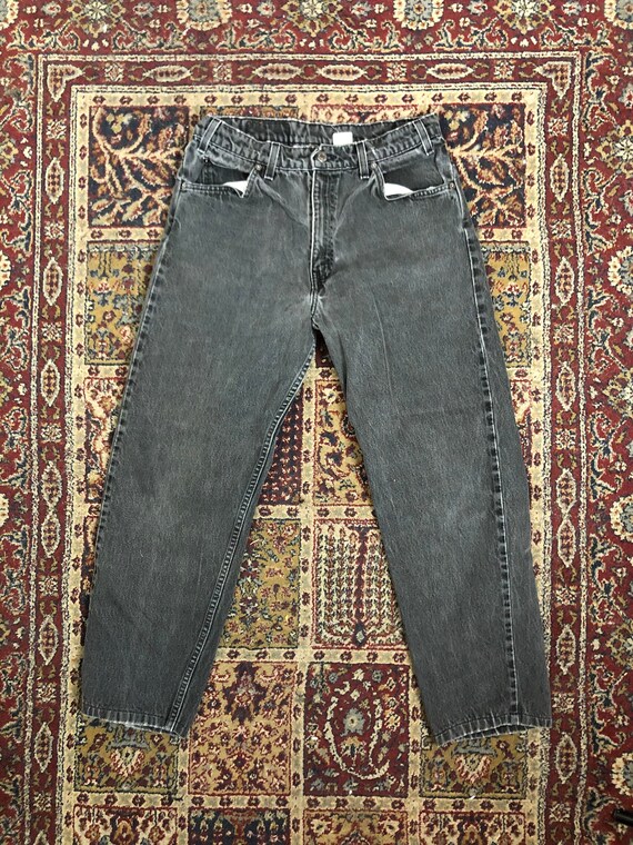 90s faded black Levi’s 550 orange tab 30”