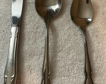 Oneida True Rose or Arbor Rose Flatware: knives & teaspoons.