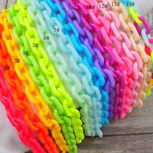 May include: A rainbow assortment of 14 plastic chain links. The links are in various colors, including red, orange, yellow, green, blue, purple, and pink. The links are numbered 1 through 14.