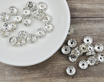 50 pezzi di perline distanziatrici rondelle, perline distanziatrici rotonde in metallo sciolte con strass color argento da 10 mm per la creazione di gioielli fai da te.
