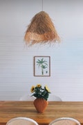Handwoven Palm Leaf Pendant Light: Zanzibar Fringed Chandelier product logo