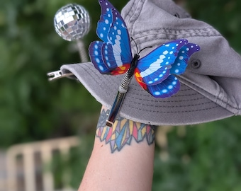 Clips de sombrero de mariposa: Moda para festivales rave