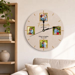 May include: A round wall clock with a light beige face featuring three square photo frames of a couple, black clock hands, and gold hour markers. The text reads Forever and always, Ethan & Sophie, and May 23, 2026, with a small heart icon.