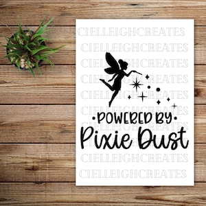 May include: Black and white silhouette of a fairy with wings and a wand, sprinkling pixie dust. The text "•POWERED BY. Pixie Dust" is below the fairy.