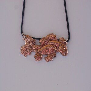 Koi, A Repousse Exclusive design
