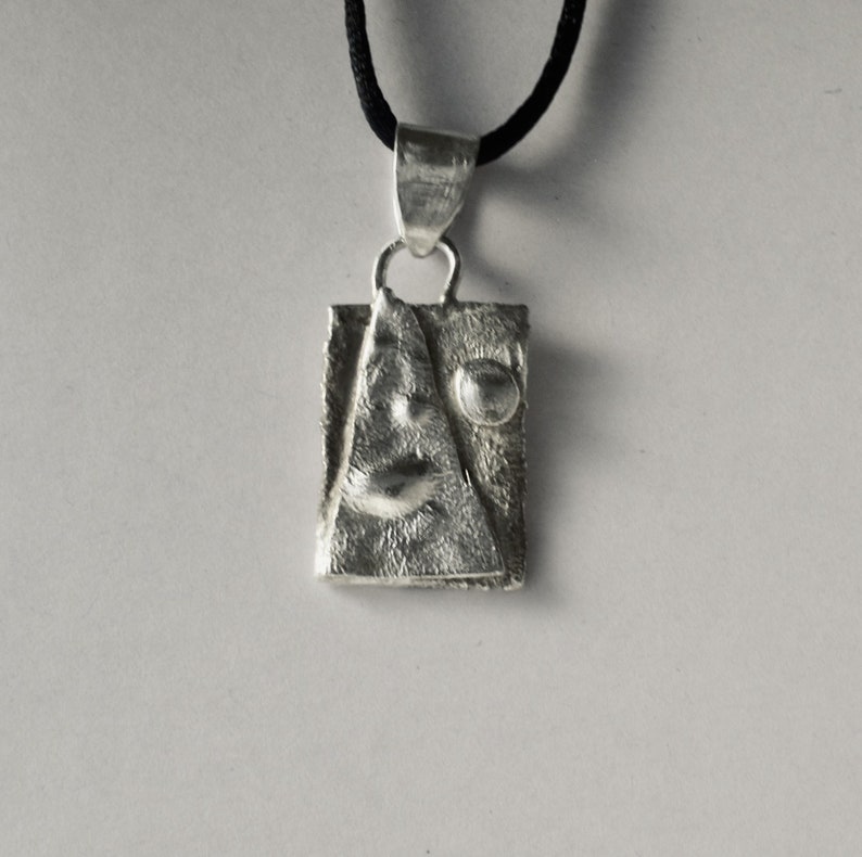 A Reticulated Rectangle Pendant A Reticulated Rectangle PendantWhat/'sIt What/'sIt