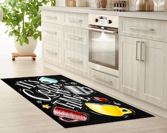 May include: Black and white kitchen rug with the text "It's Coffee Time" in a chalk-style font. The rug features colorful illustrations of coffee mugs.