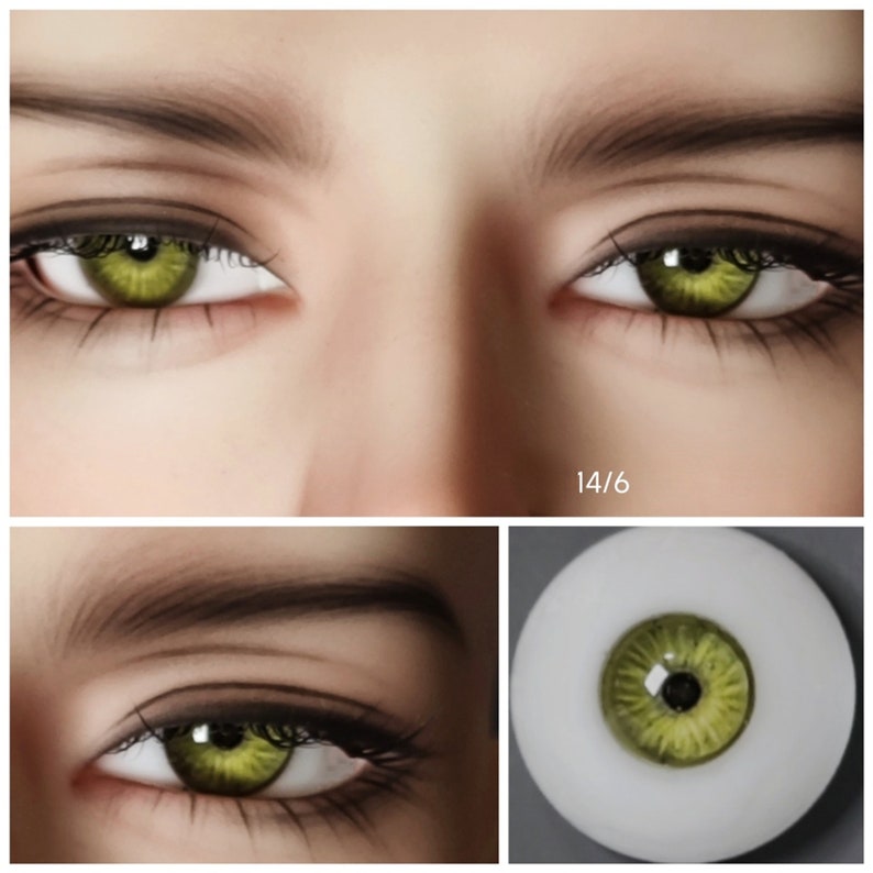 May include: Close-up of a pair of green glass eyes for dolls. The eyes are set in a white plastic base and have a black pupil. The eyes are 14/6 size.