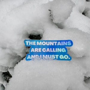The Mountains Are Calling and I Must Go Holographic Sticker