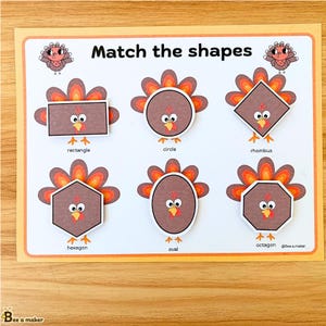 May include: A printable Thanksgiving-themed educational activity for kids. The worksheet features a variety of shapes, including a circle, rectangle, rhombus, hexagon, oval, and octagon, with each shape represented by a cartoon turkey. The text "Match the shapes" is at the top of the worksheet.