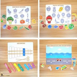May include: Four colorful learning mats with different themes: vegetables, fruits, size sorting, and vehicles. Each mat has a title and images of various items to be matched or sorted. The mats are designed for children's educational activities.